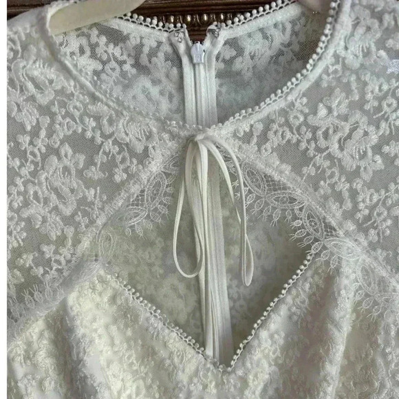 ML Monique Lhuillier Tie-Neck Ivory Lace Mini Long Sleeve Bridal Dress - Picture 7 of 10